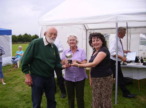 John and Judeth Lycett receiving their prize from Julia Booth
