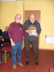 Glen Hughes receives the Chairman's Award from Harry Wiles