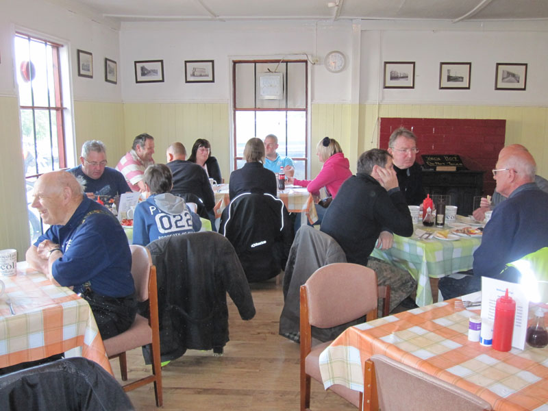 Riders and passengers enjoying a hearty breakfast.