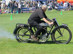 Dave Mac riding his Rudge in the arena